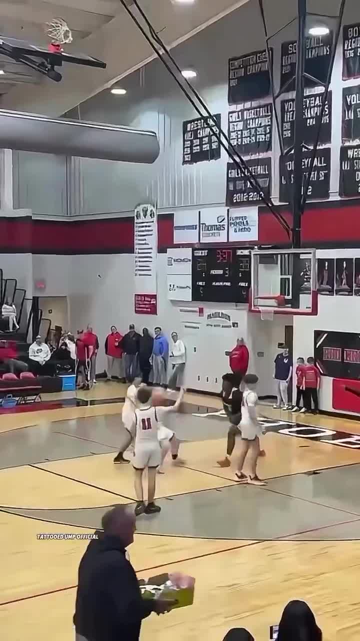 georgia-high-school-basketball-player-assaults-two-opponents-with-haymakers-in-wild-scene-1737692284.mp4