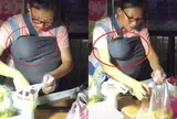 Thấy người phụ nữ bán hàng đeo túi trước ngực, khách tò mò nhìn vào rồi đồng loạt ghé mua nườm nượp