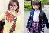 Bé học sinh Hà Nội quá xinh liên tục xuất hiện trên tivi, nhìn sang mẹ ruột là "cô giáo búp bê đình đám MXH" mới giật mình