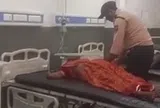 Sự thật kinh hoàng phía sau clip nam bảo vệ bệnh viện tự tay cắm kim truyền dịch gây bão mạng