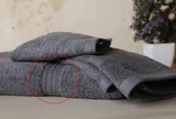 Tưởng chỉ để làm đẹp, những đường dệt ngang trên khăn tắm thực ra có 5 công dụng