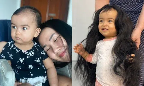 Con gái Võ Hạ Trâm tóc mọc nhanh khó tin, dài tới chân sau hơn 1 tháng thôi nôi