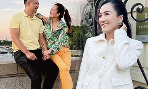 Check in Paris, bà xã đại gia Bình Minh tình tứ bên chồng, hờ hững cúc áo khoe vẻ quyến rũ