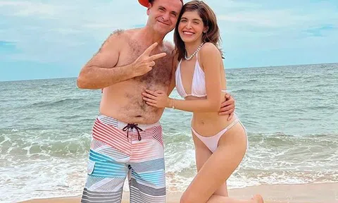 Đi tắm biển với bố, An Tây vẫn không ngại khoe body rực cháy không mỡ thừa