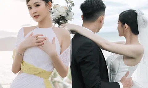 Gần ngày lên xe hoa, Lê Âu Ngân Anh “nhá hàng” váy cưới xuyên thấu, nhìn phía sau đủ choáng
