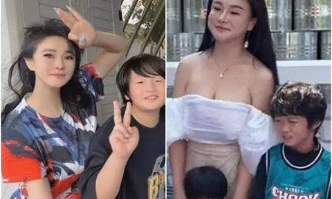 Dự sự kiện, mẹ ăn mặc gợi cảm xuất hiện bên 3 con trai nhận nhiều chỉ trích