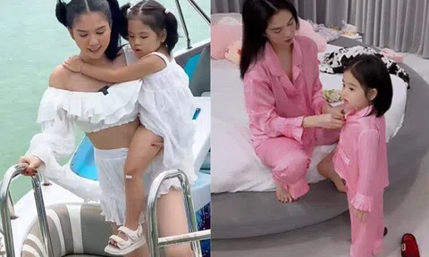 Ngọc Trinh đi làm mặc ngắn trên hở dưới, cạnh "con gái" lại kín đáo, ra dáng mẹ bỉm