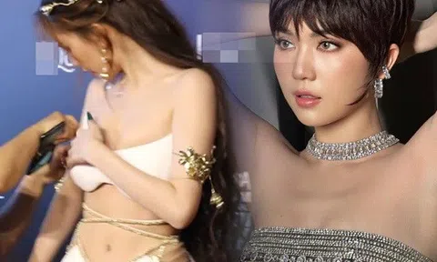 Để tóc tém lạ lẫm đã đành, Ngọc Trinh còn diện áo chưa quá gang tay, hớ hênh "cặp tuyết lê" khiêm tốn