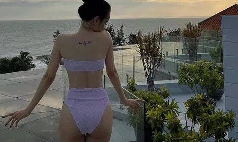 Mỹ nhân xăm mình quay lưng với ống kính, đẹp vô thực trong trang phục lấp ló da thịt