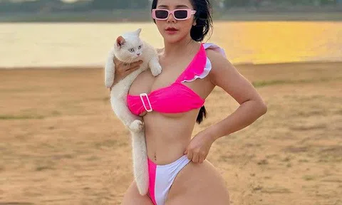 Chụp ảnh với mèo trên biển, hotgirl Vĩnh Phúc có khung xương chậu đẹp nức nở nhận "bão like"