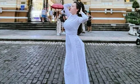 Bà Tưng Huyền Anh thả dáng nuột với áo dài nữ sinh, mặc tinh tế không lộ chút khuyết điểm