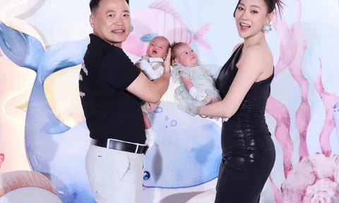 Phương Oanh khoe dáng chuẩn với váy bó trong tiệc đầy tháng cặp song sinh, 2 con Shark Bình lần đầu lộ rõ mặt