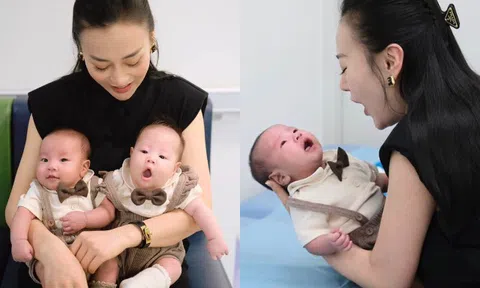 Phương Oanh một tay bế 2 "cá mập con" đi tiêm chủng, quý tử Jimmy 2 tháng tuổi biểu cảm y chang bố Shark Bình