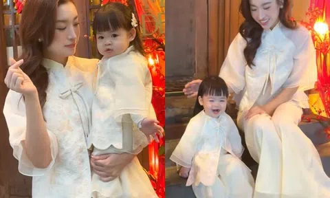 Cháu gái Bầu Hiển xúng xính áo dài Tết cùng mẹ Hoa hậu, Đỗ Mỹ Linh “lu mờ” trước loạt biểu cảm xinh như nàng thơ của ái nữ