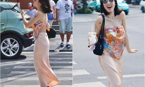 Nữ ca sĩ Việt "mặc khăn" nóng bỏng trên phố: 41 tuổi chưa chồng, trẻ xinh qua cam thường dù tóc bạc đầy đầu