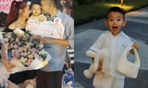 Minh Hằng và chồng đại gia ôm ấp tình cảm, để quý tử hơn 1 tuổi lẽo đẽo "tay xác nách mang" theo sau