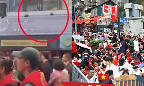 Đứng xem hợp luyện diễu binh A80, ai nấy chú ý tới hành động của người đàn ông trên ô cửa sổ tầng 2 căn nhà mặt phố