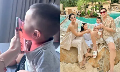 Bạn gái Quang Minh khoe cảnh con hôn tới tấp vào điện thoại khi bố đi làm xa, quý tử bé xíu đã sống tình cảm