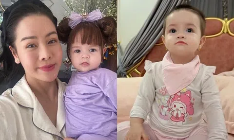 Ái nữ lai nhà Nhật Kim Anh là phiên bản mini của mẹ, ánh mắt long lanh nhìn không rời khi thấy phụ huynh trên tivi