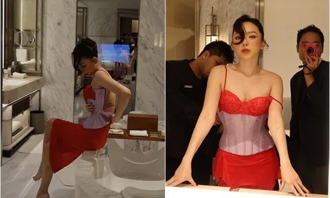 Đang bị đồn rạn nứt với chồng, "cô Tiên" của showbiz Việt khoe loạt ảnh "nóng rực", được một người đàn ông kéo khóa váy