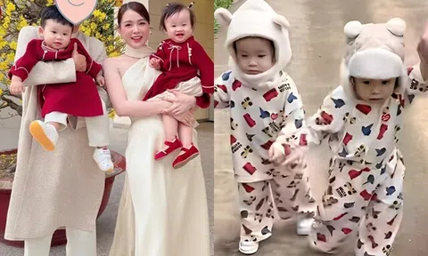 "Phù bà" Sam cho cặp sinh đôi lai Hàn Quốc mặc đồ giống nhau như cục bông, nắm tay đi dạo tình tứ với người giấu mặt