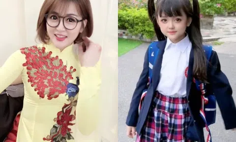 Bé học sinh Hà Nội quá xinh liên tục xuất hiện trên tivi, nhìn sang mẹ ruột là "cô giáo búp bê đình đám MXH" mới giật mình
