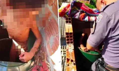 Giải cứu bé trai 11 tuổi bị cha ruột xích trong thùng kim loại