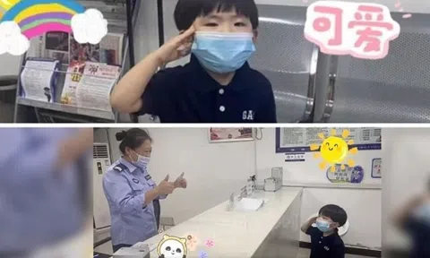 Clip bé trai 4 tuổi nghiêm nghị chào cảnh sát "đốn tim" hàng triệu cư dân mạng
