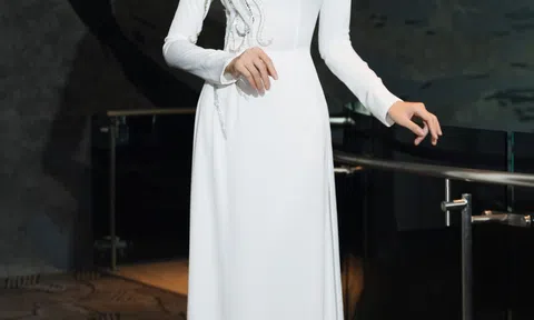 Không còn cắt xẻ táo bạo, Hoa hậu Thùy Tiên quay trở lại với áo dài truyền thông khi đi sự kiện