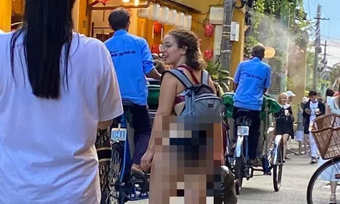 Loạt ảnh du khách vô tư mặc "mát mẻ" đi dạo phố cổ Hội An gây tranh cãi