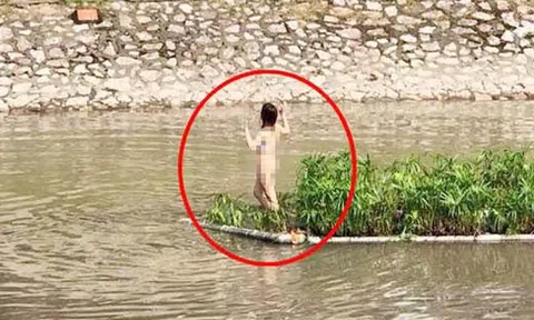 Cô gái trẻ lột đồ bơi ra giữa sông Tô Lịch nhảy múa bất thường