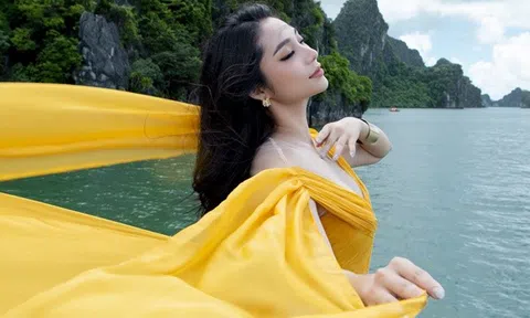 Hình ảnh Lâm Thu Hồng diện váy dạ hội đẹp như tranh ở vịnh Hạ Long