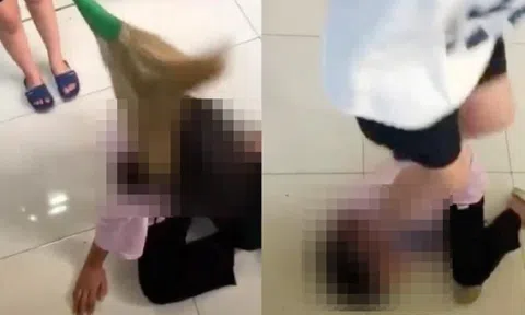 Đình chỉ nhóm học sinh lấy chổi quét lên đầu bạn