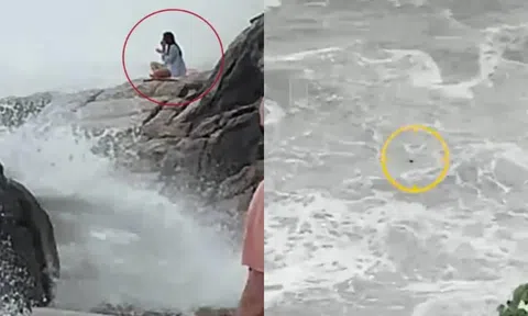 Clip: Cô gái chới với khi bị sóng cuốn trôi trong lúc ngồi thiền trên vách đá