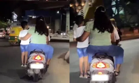 Clip: Cặp đôi đi xe máy, cho con trai "làm xiếc" giữa đường gây phẫn nộ
