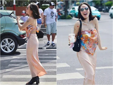Nữ ca sĩ Việt "mặc khăn" nóng bỏng trên phố: 41 tuổi chưa chồng, trẻ xinh qua cam thường dù tóc bạc đầy đầu