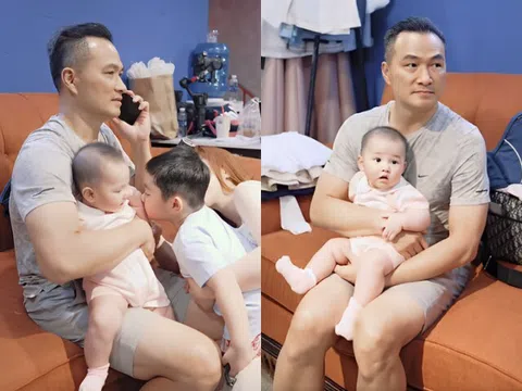 Chi Bảo bận công việc vẫn ngồi ôm con cho vợ đại gia làm điệu, bà xã nhìn ái nữ thừa nhận mình "đẻ thuê"