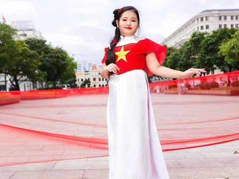 Mẫu nhí Dory Như tỏa sáng trong tà áo dài đỏ sao vàng mừng 2/9