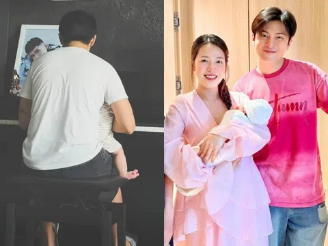 Puka khoe cảnh chồng bế ru con sau nửa năm sinh bé đầu lòng, nhóc tì nay bụ bẫm, đầu đầy tóc