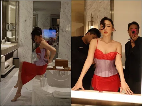 Đang bị đồn rạn nứt với chồng, "cô Tiên" của showbiz Việt khoe loạt ảnh "nóng rực", được một người đàn ông kéo khóa váy