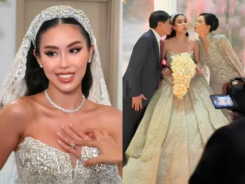 Hôn lễ em chồng Tăng Thanh Hà: Vợ chồng tỷ phú hôn con gái ngọt ngào, Tiên Nguyễn diện váy cưới lộng lẫy