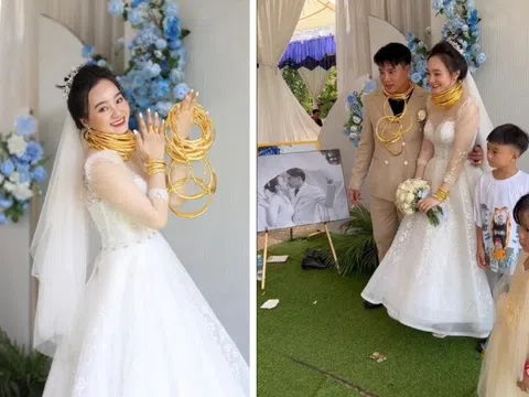 Chú rể hạ đường huyết khi đang "phụ" cô dâu đeo 40 cây vàng trong ngày cưới