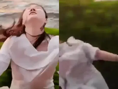 Clip: Thò ra ngoài cửa sổ chụp ảnh, người phụ nữ mắc vào cành cây bị kéo ra khỏi tàu đang chạy nhanh