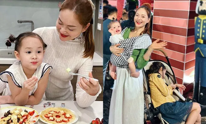 Con gái lai Tây cực xinh nhà Lan Phương tránh ống kính khi bị chụp ảnh, co ro trốn trong nôi của em gái