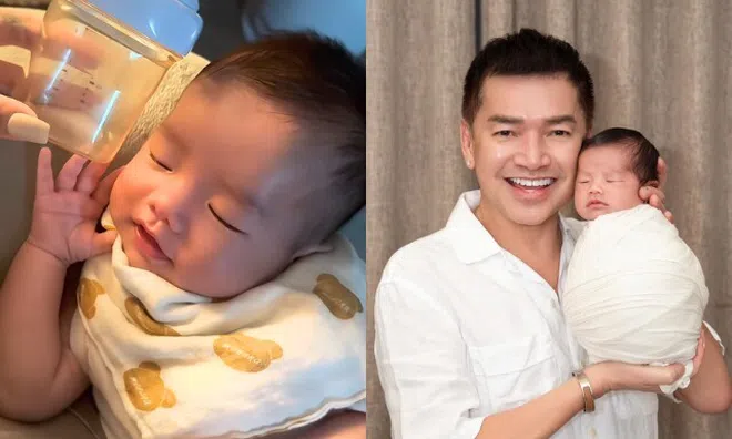 Quý tử Quang Minh "say sữa" vào giấc miệng vẫn cười trông cực yêu, mặt khôi ngô, môi trái tim giống bố như đúc