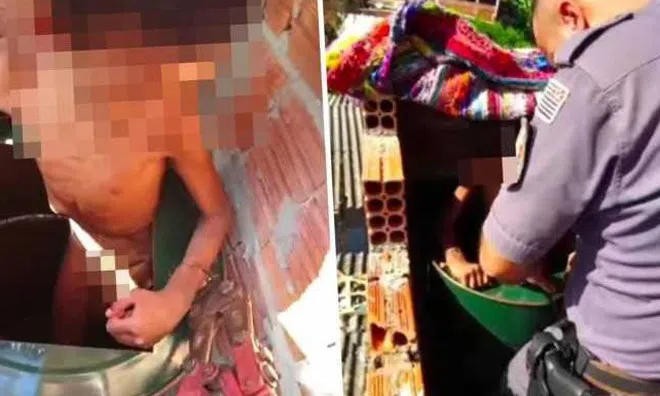 Giải cứu bé trai 11 tuổi bị cha ruột xích trong thùng kim loại