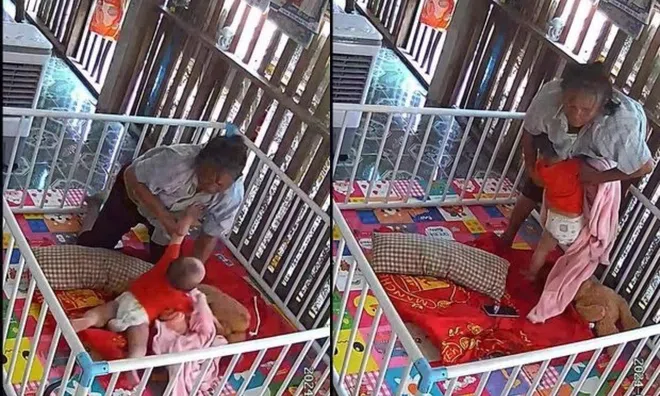 Khoảnh khắc bà ngoại phản ứng cực nhanh bế cháu thoát khỏi con rắn đang lao tới tấn công
