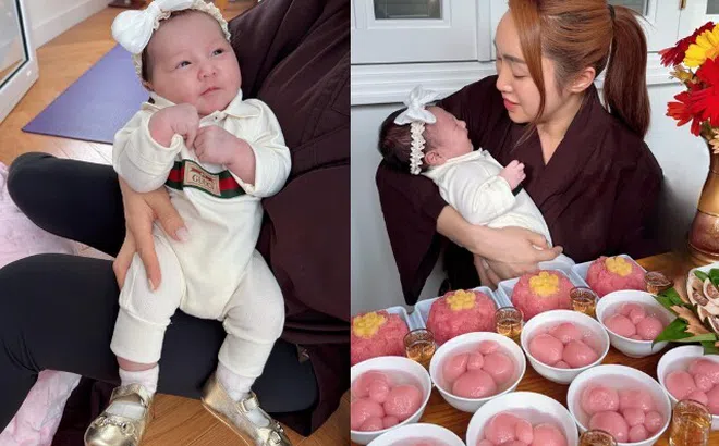 Con gái Chi Bảo mặc "cây" đồ hiệu chục triệu trong tiệc đầy tháng, diện mạo rõ đẹp mắt to mũi cao vút như Tây